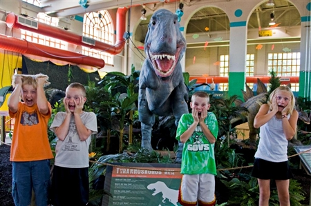 A few kids enjoying the special dinosaur exhibit from summer 2010. (Department of Tourism photo)