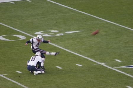 Adam Vinatieri warms up during the pre-game of Super Bowl XXXIX. (Image from Wikimedia Commons)